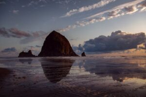 Top Family-Friendly Hotels and Rentals Surfsand Resort: Offers kid-friendly activities and amenities like beach toys and family suites. Tolovana Inn: With its indoor pool and proximity to the beach, it’s a hit with families. Vacation Rentals: Consider a rental home with multiple bedrooms and a full kitchen for more space and flexibility. Romantic Getaways Cannon Beach’s scenic beauty and serene atmosphere make it an ideal destination for couples seeking a romantic escape. Features of a Perfect Romantic Stay The perfect romantic stay in Cannon Beach should offer privacy, comfort, and a touch of luxury. Look for accommodations with ocean views, private balconies, or in-room fireplaces to set the mood. Best Places for Couples to Stay in Cannon Beach Stephanie Inn: Known for its luxurious rooms and romantic ambiance. The Ocean Lodge: Offers cozy, romantic rooms with ocean views. The Waves: Centrally located with charming, intimate rooms perfect for couples. Unique and Boutique Stays For travelers looking for something a little different, Cannon Beach has a variety of unique and boutique accommodations that offer a one-of-a-kind experience. The Appeal of Unique Lodging Experiences Unique accommodations often reflect the local character and culture, providing a more immersive experience. These stays might include boutique hotels with artistic decor, historic inns, or creatively designed vacation rentals. Boutique Hotels and Unique Accommodations The Ocean Lodge: Combines rustic charm with modern comforts in a beachfront setting. McBee Cottages: These charming cottages offer a quaint, vintage experience just steps from the beach. Cannon Beach Hotel: A historic boutique hotel with a romantic, European-style ambiance. Seasonal Considerations Cannon Beach’s accommodations vary in availability and atmosphere depending on the season. Here’s what to consider when planning your stay: How the Season Affects Your Stay Summer: Expect higher prices and more crowds, but also more activities and events. Fall: Fewer tourists, cooler weather, and beautiful fall colors. Winter: Cozy, quiet, and perfect for storm watching or a peaceful retreat. Spring: Mild weather, blooming flowers, and a good time for outdoor activities. Best Accommodations for Different Seasons Winter: Cozy inns with fireplaces and ocean views, like The Ocean Lodge or Stephanie Inn. Summer: Family-friendly resorts with beach access, such as Surfsand Resort. Spring/Fall: Mid-range hotels or vacation rentals that offer comfort and good value. Tips for Booking Your Stay Finding the perfect place to stay in Cannon Beach involves more than just picking a hotel. Here are some tips to ensure you get the best deal and the most suitable accommodation: How to Get the Best Deals Book in advance: Especially during peak seasons. Look for package deals: Some hotels offer packages that include meals, activities, or spa services. Check for discounts: Senior, military, or AAA discounts can often be applied. What to Consider When Booking Location: Proximity to the beach and attractions. Amenities: Consider what is essential for your stay, such as kitchens, pools, or pet-friendly options. Reviews: Read recent guest reviews to get a sense of what to expect. Conclusion Where to stay when visiting Cannon Beach